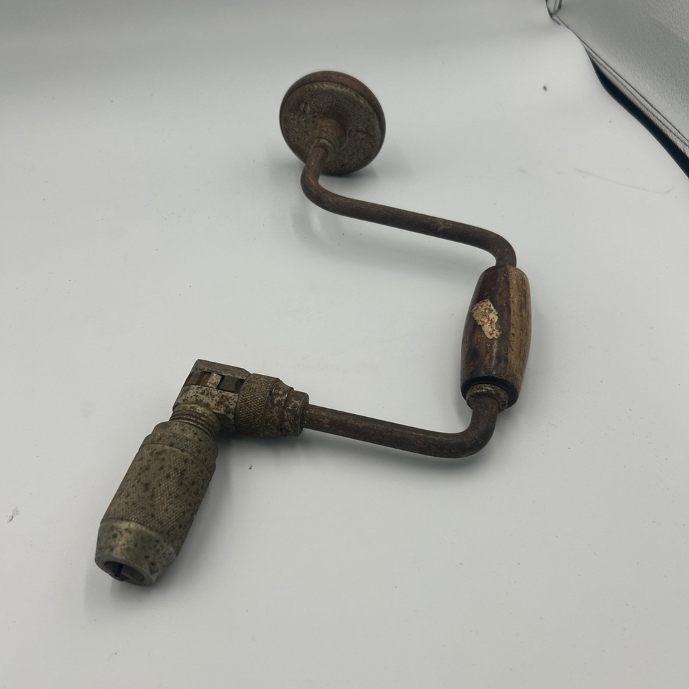 Vintage Hand Crank Drill Rustic, And Rusted Vintage Tool.